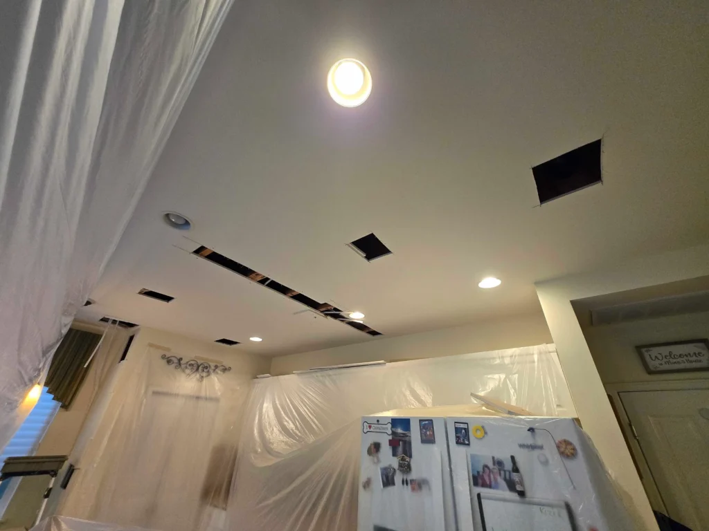 PEX repiping Seattle wall access work during pipe replacement and restoration process